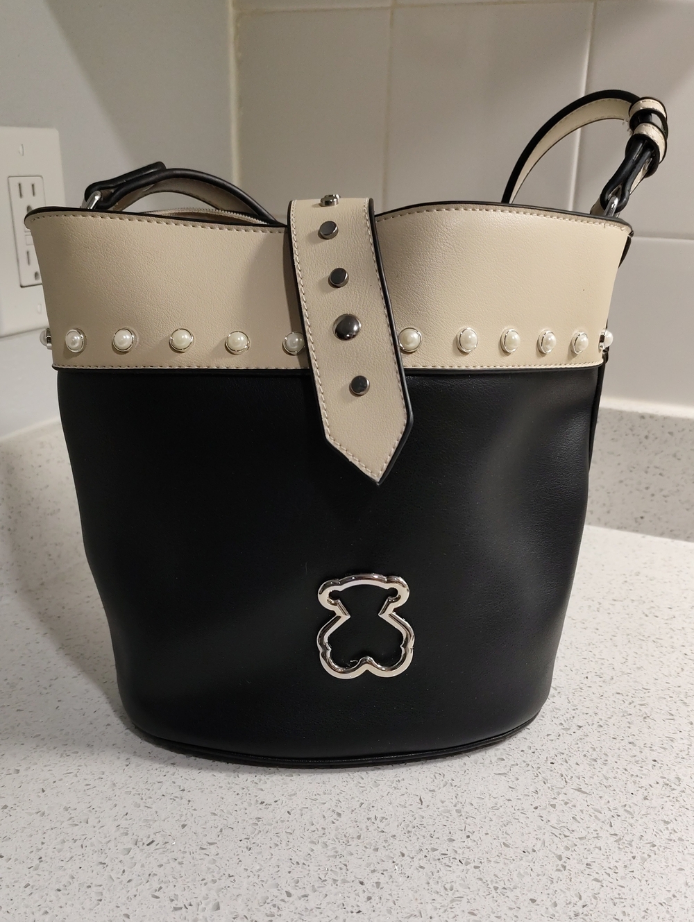 Tous Black and Cream Shoulder Bucket Bag with Stud and Pearl Accents